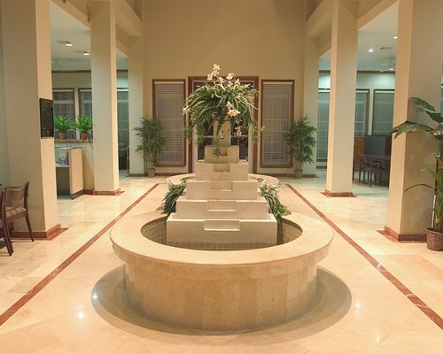 Interior view of a lounge area with fountain.