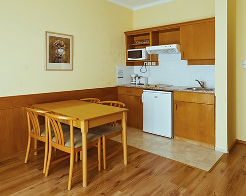 An open plan kitchen and dining area.