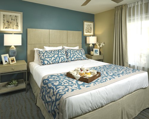 The Bedroom at The Villas at Summer Bay Orlando By Exploria Resort