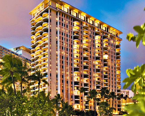 Scenic exterior view of Lagoon Tower By Hilton Grand Vacations Club at night.