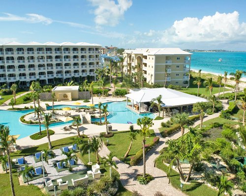 Exterior view of The Alexandra Resort and Spa with outdoor swimming pool.