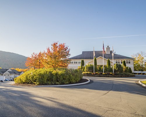 Exterior view of Vacation Village in the Berkshires with multiple balconies.