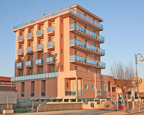 Exterior view of Abbazia Club Hotel Marotta with multiple balconies.