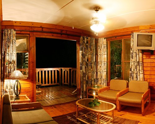 A well furnished living room with a balcony.