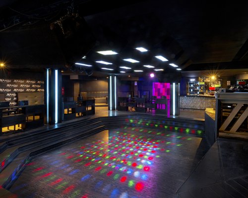 Dance club and bar with lighting effects.