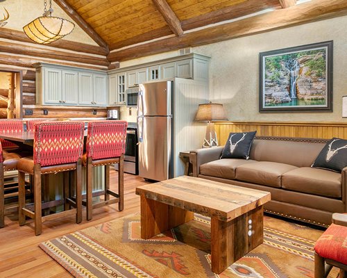 A well furnished bedroom with a king bed.