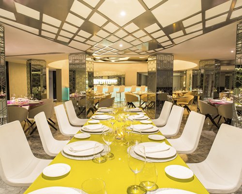A well furnished indoor fine dining restaurant with a bar.