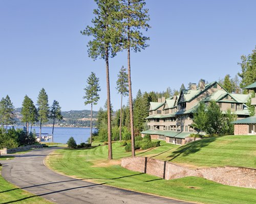 A scenic view of the WorldMark Arrow Point resort alongside a waterfront.