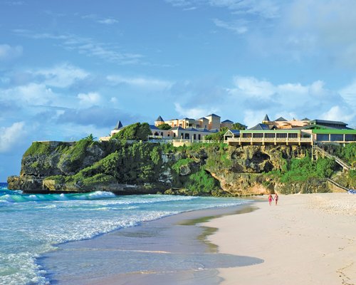 A view of the Crane Residential Resort alongside the ocean.