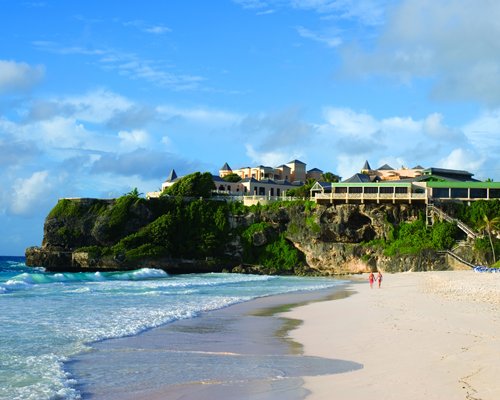 A beach view alongside The Crane Residential Resort.