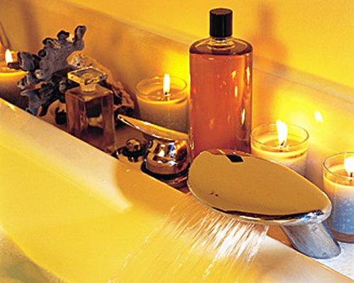 A view of massage equipment near candles.