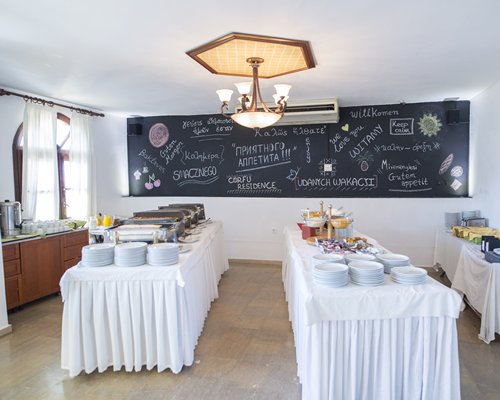 Indoor restaurant with buffet at Corfu Residence.