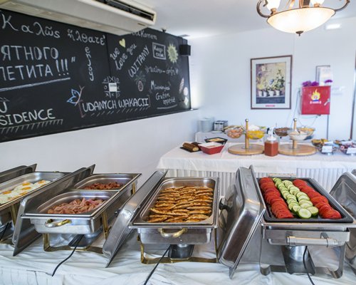 View of variety of food items being served at a restaurant.
