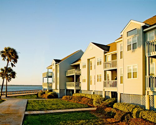 A street view of Wyndham Ocean Ridge II resort alongside the ocean.