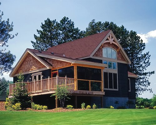 Scenic exterior view of a unit with golf course.