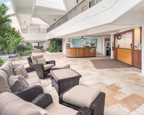 THE RECEPTION AREA WITH LOUNGE ACCESS.
