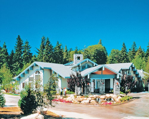 An exterior view of the resort units surrounded by trees.