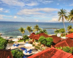 VIEW OF THE BALI SEASCAPE BEACH CLUB RESORT ALONGSIDE THE BEACH.