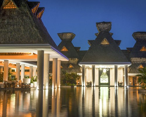 An exterior view of the resort at night.