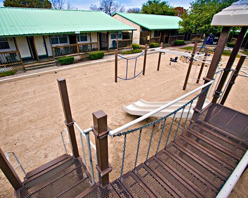 A view of an outdoor staircase alongside resort units.