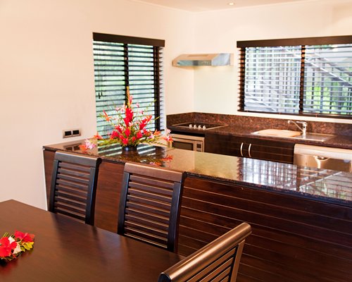 An open plan kitchen and dining area.