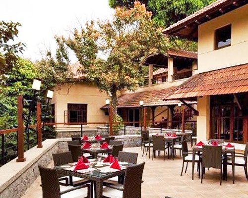An exterior view of the resort with a fine dining area.
