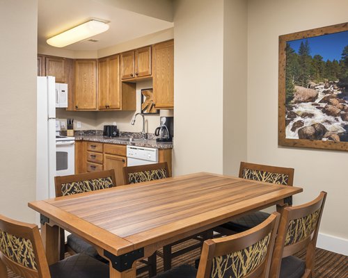 A well equipped kitchen with dining area.
