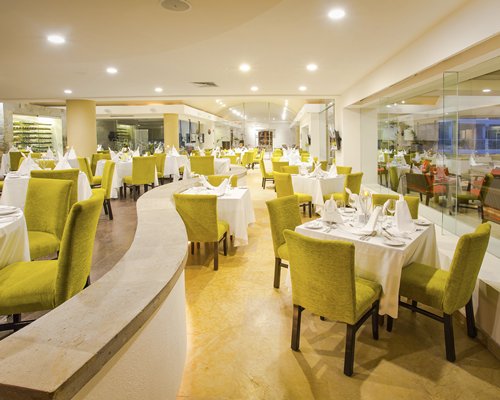 A restaurant at Marival Resort & Suites.