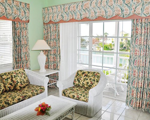 A well furnished living room with a patio.