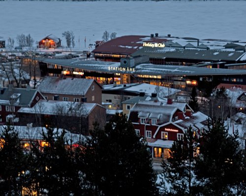 An aerial view of resort property covered in snow.