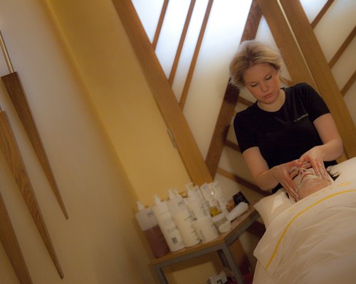 A woman having a massage at the spa.