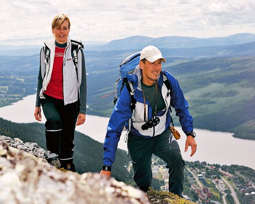A couple trekking in the mountain.