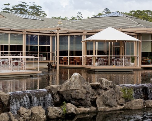 An exterior view of the resort with the waterfront.