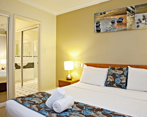 A well furnished bedroom with a king bed.