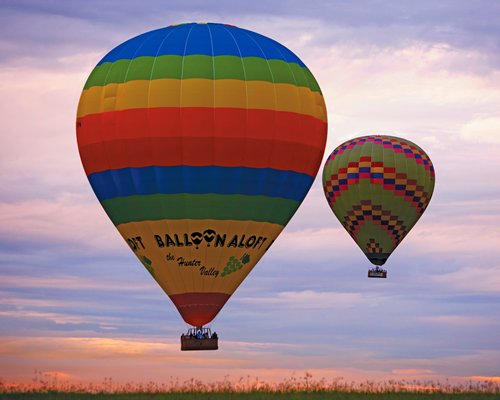 View of air balloons at dusk.