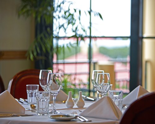A view of the fine dining area with an outside view.