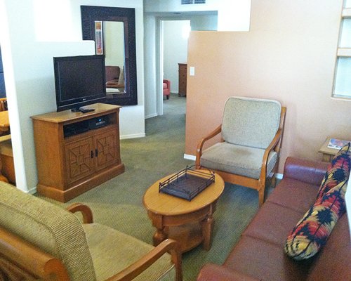 A well furnished living room with television.