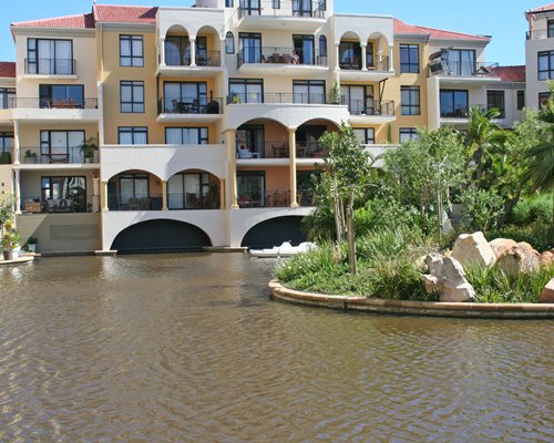 Exterior view of the Protea Hotel Island Club alongside the waterfront.