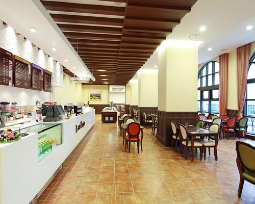Indoor restaurant with outside view.