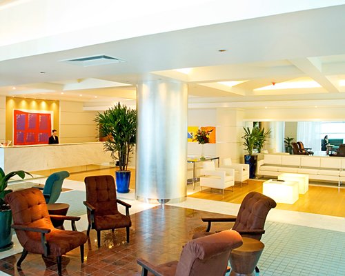 An indoor lounge area with the reception counter at the resort.
