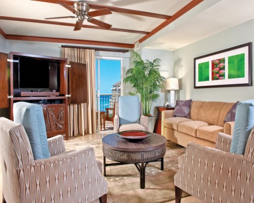 A well furnished living room with a television.