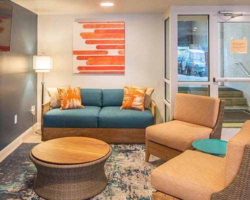 A well furnished living room with a sofa.