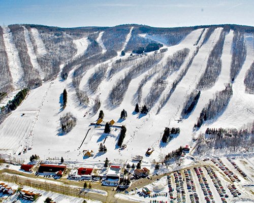 An aerial view of Hope Lake Lodge Resort with downhill skiing during winter.