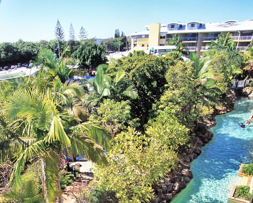 An outdoor pool alongside the resort.