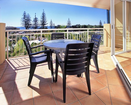 Balcony with patio furniture.