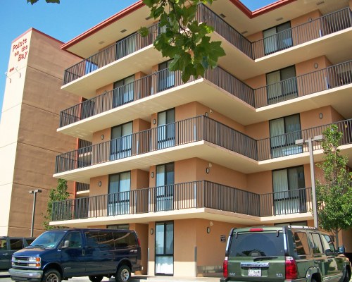A SCENIC VIEW OF THE MULTI STORY UNITS OF THE RESORT.