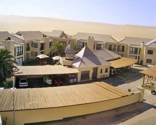A view of the resort property alongside a desert.