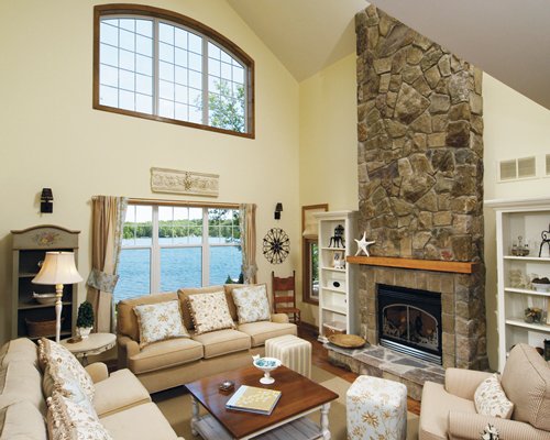 A well furnished living room with a fireplace.