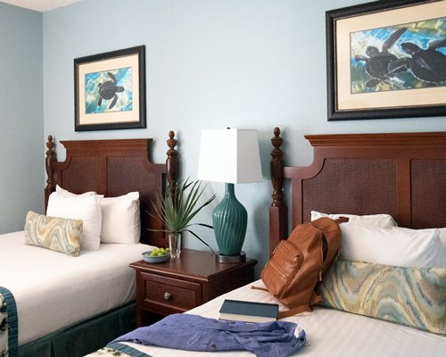 A well furnished living room with dining area and breakfast bar.