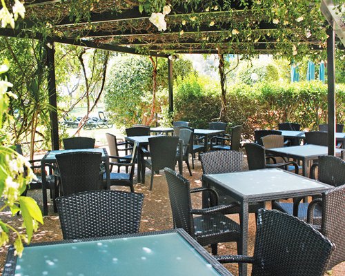 The landscaped outdoor restaurant at Royal Dom Pedro Vilamoura Resort.